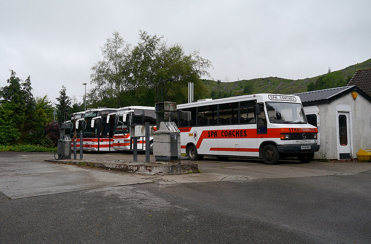 A depot of coaches, a working fleet of the kind that uploads video over 4G to a central platform