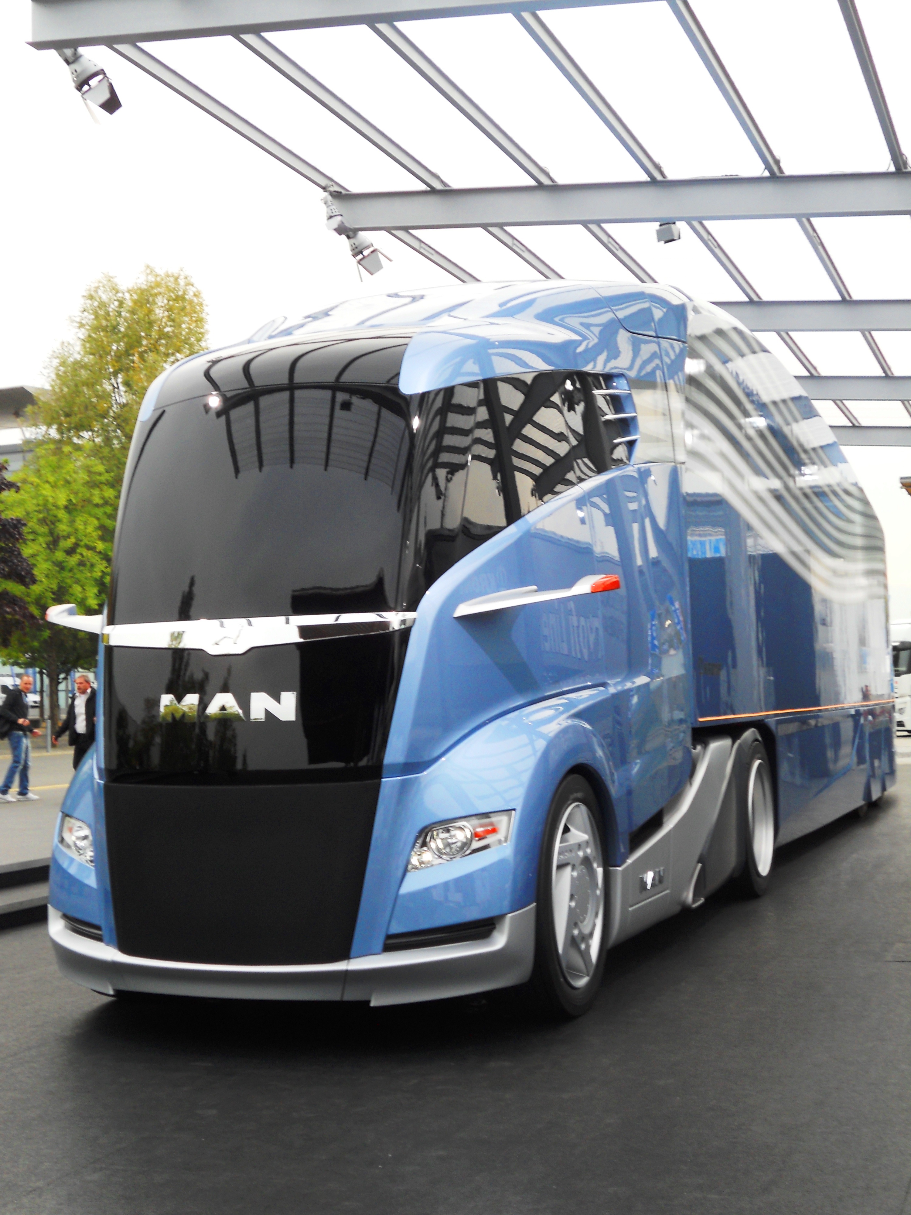 Front view of a modern MAN concept heavy commercial truck with an aerodynamic trailer