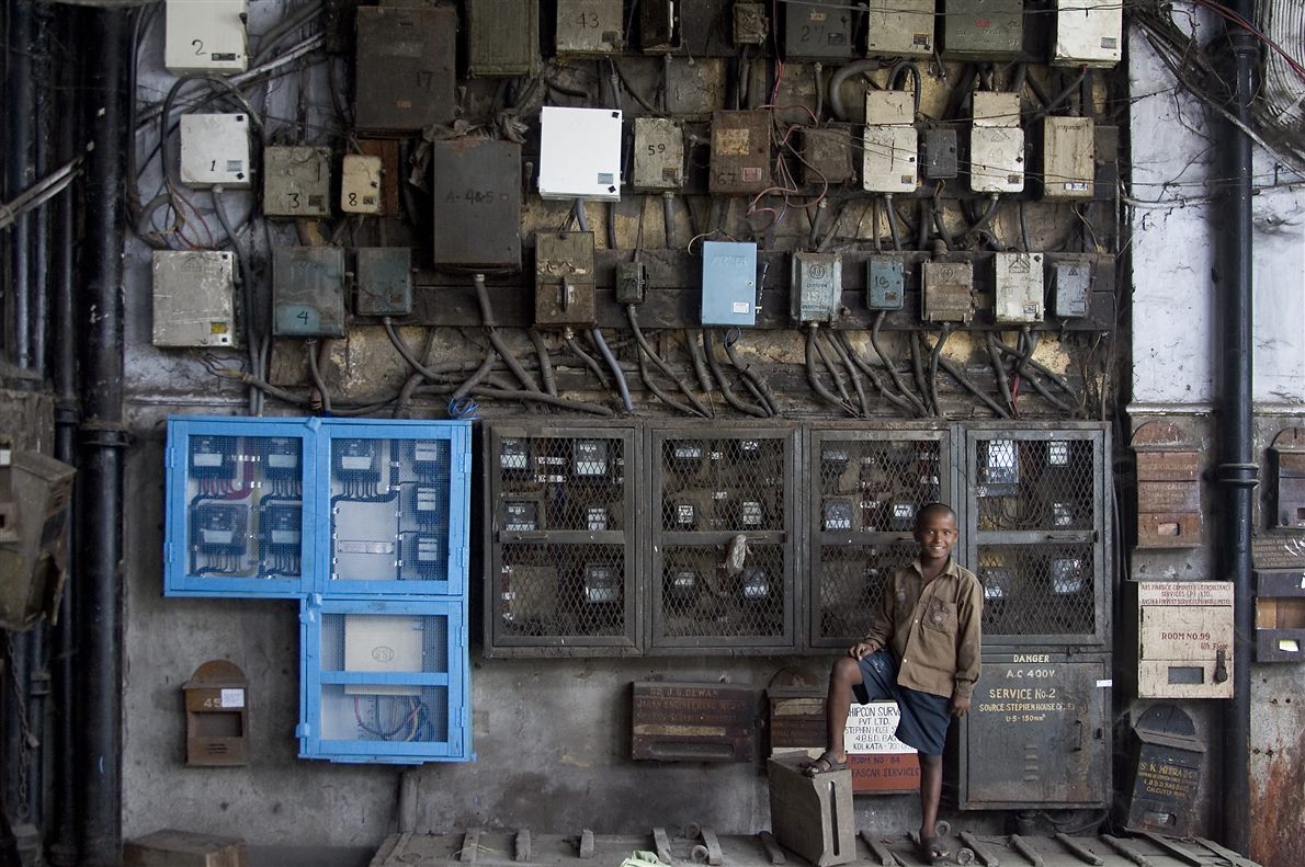 A wall of electricity meters, one per household