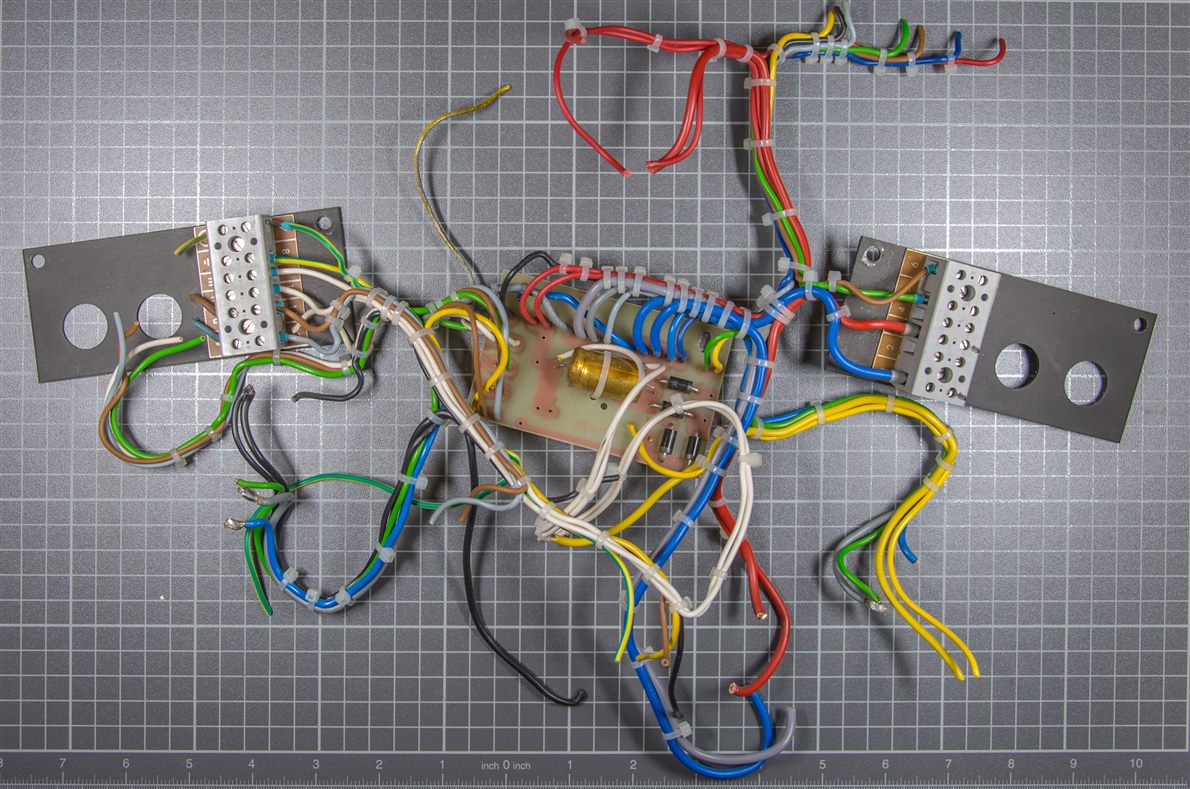 Wiring harness with bound leads and terminal boards on a measurement grid