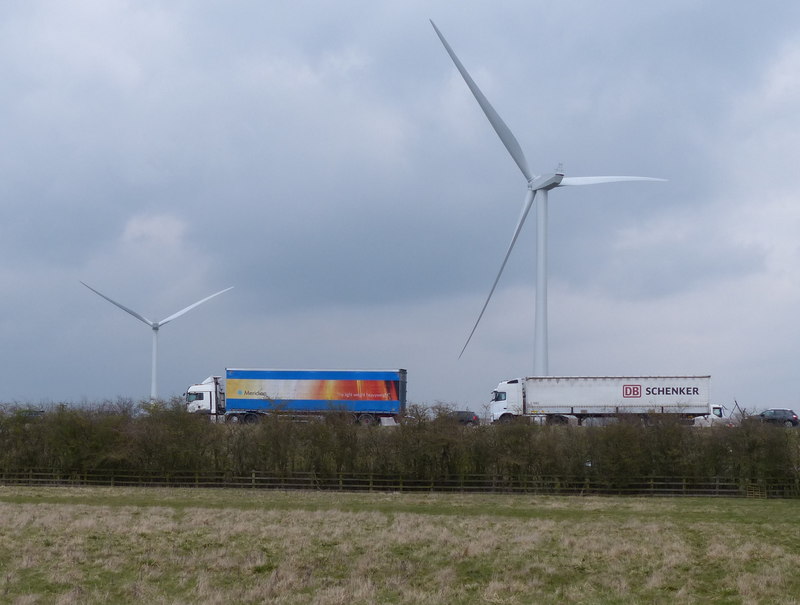 Two articulated goods vehicles travelling on a motorway