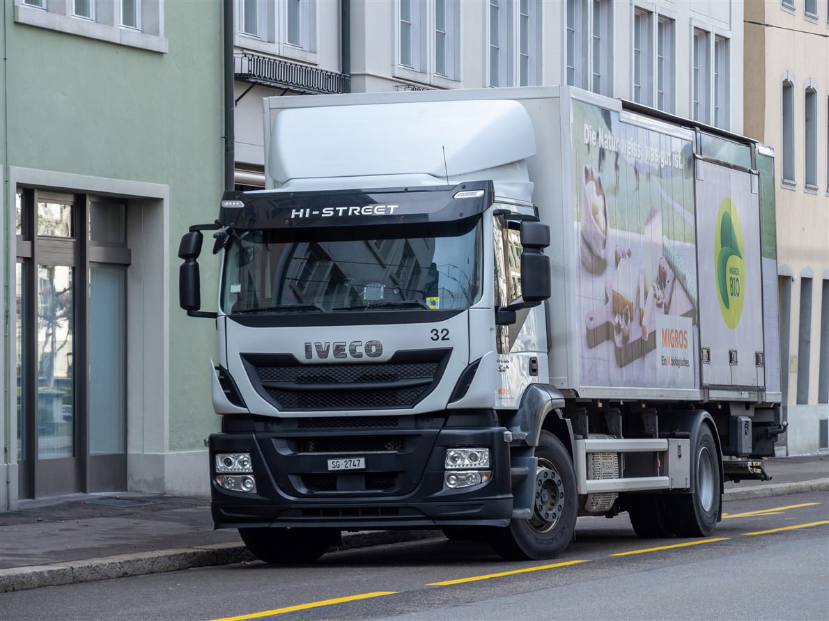 White IVECO Stralis delivery truck on a street