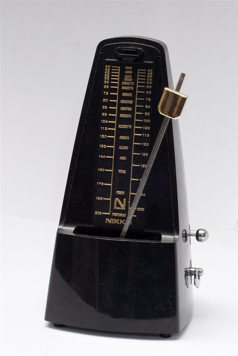 A mechanical metronome with its tempo scale